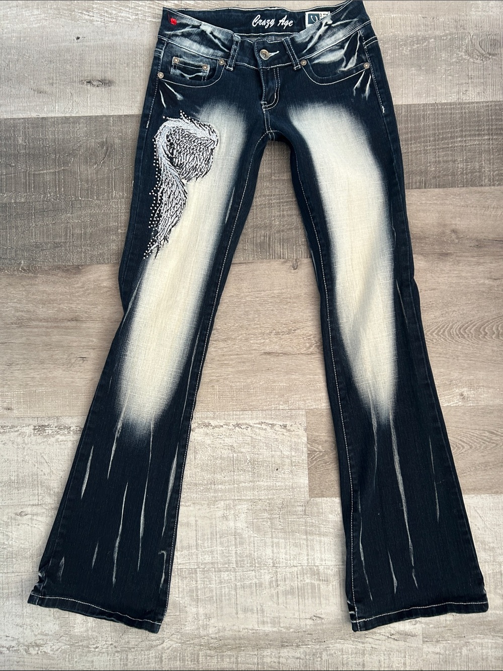 Crazy age low rise Jeans with Rhinestone Detail. Angel wings on back butt